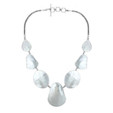 Women’s sterling silver necklace with teardrop Mother of Pearl stones and Bali-inspired accents.